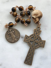 Load image into Gallery viewer, Tiger Eye Rosary: Ox Bone Skull, Bronze Saint Patrick Celtic Cross