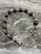 Load image into Gallery viewer, Cross Garnet and Bronze Rosary Bracelet