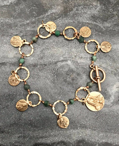 Seven Sorrows Bronze Charm Bracelet - Emerald Gemstones