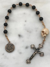 Load image into Gallery viewer, Memento Mori Pocket Rosary - Lava Bead and Ox Bone Skull - Bronze - Tenner - Saint Michael - Single Decade Rosary
