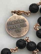 Load image into Gallery viewer, Memento Mori Pocket Rosary - Lava Bead and Ox Bone Skull - Bronze - Tenner - Saint Michael - Single Decade Rosary
