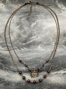 Seven Sorrows Necklace- OL of Sorrows, Garnet Gemstones and Bronze