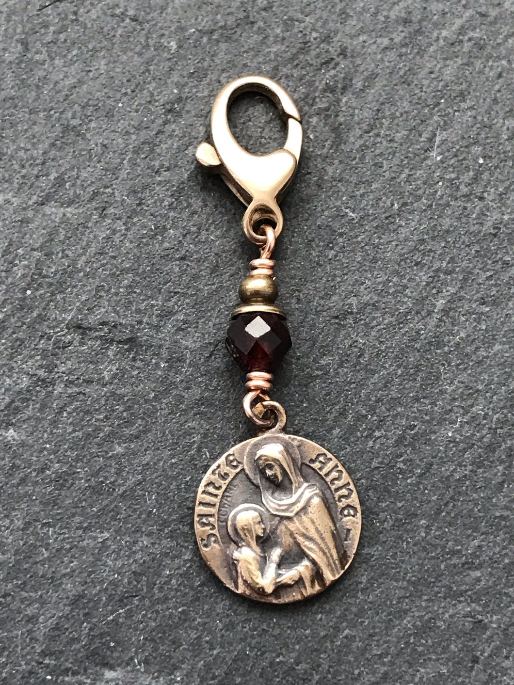 Bag Charm Saint Ann Anne Zipper Pull - Bronze and Garnet