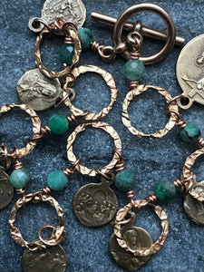 Seven Sorrows Bronze Charm Bracelet - Emerald Gemstones