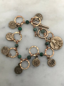 Seven Sorrows Bronze Charm Bracelet - Emerald Gemstones